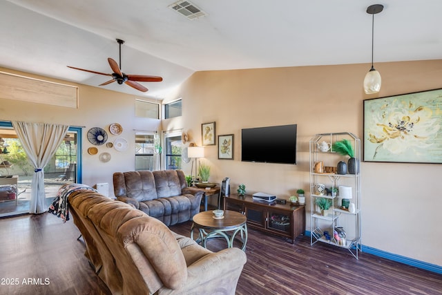 living room with ceiling fan, dark hardwood / wood-style flooring, and lofted ceiling