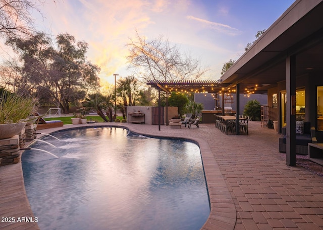 pool featuring a pergola and a patio