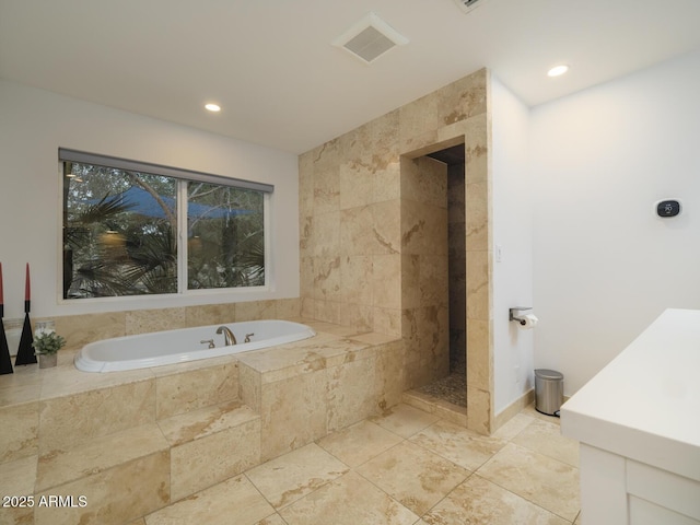 full bath with tiled shower, a garden tub, visible vents, and recessed lighting