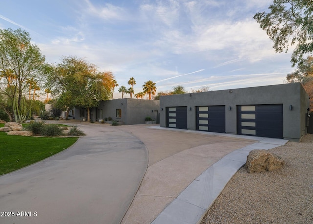 contemporary house featuring stucco siding