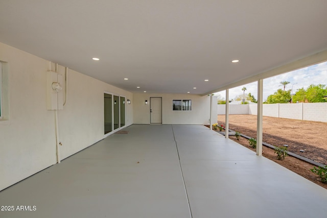 view of patio / terrace featuring fence