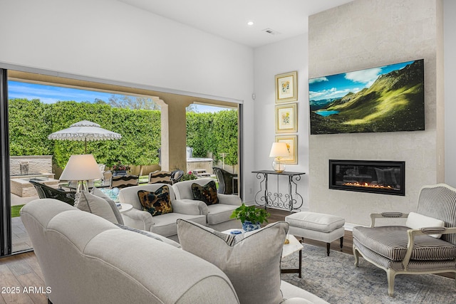 5542 E Alan Ln, Paradise Valley, AZ 85253 - living area with wood finished floors, a fireplace, and recessed lighting