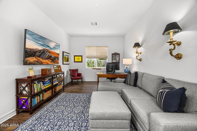 5542 E Alan Ln, Paradise Valley, AZ 85253 - living room featuring wood finished floors, baseboards, and a desk