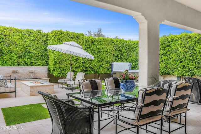 5542 E Alan Ln, Paradise Valley, AZ 85253 - view of patio with a fire pit and outdoor dining area