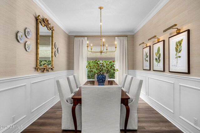 5542 E Alan Ln, Paradise Valley, AZ 85253 - dining space featuring a chandelier, crown molding, a wainscoted wall, dark wood-type flooring, and a decorative wall