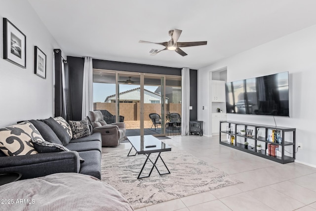 1005 W Lincoln Ave, Coolidge, AZ 85128 - living room with ceiling fan and light tile patterned floors