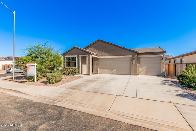 1005 W Lincoln Ave, Coolidge, AZ 85128 - ranch-style home featuring a garage, stucco siding, concrete driveway, and a tile roof
