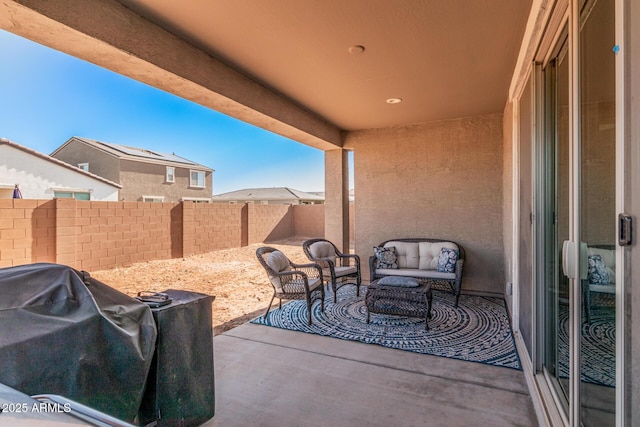 1005 W Lincoln Ave, Coolidge, AZ 85128 - fenced backyard with a patio area, outdoor lounge area, and a grill