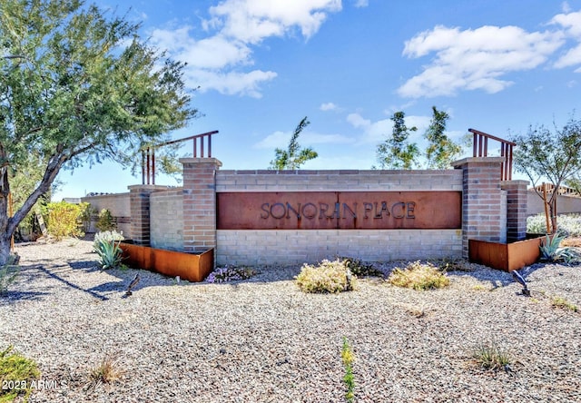 view of community sign