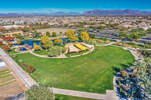 bird's eye view with a water and mountain view