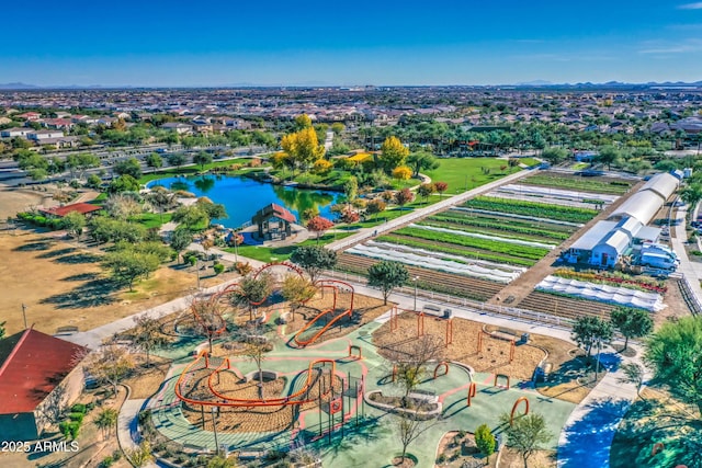 bird's eye view with a water view