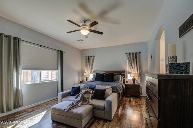 bedroom featuring ceiling fan and dark hardwood / wood-style flooring