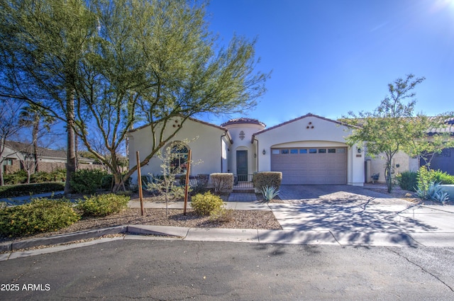 mediterranean / spanish-style home featuring a garage