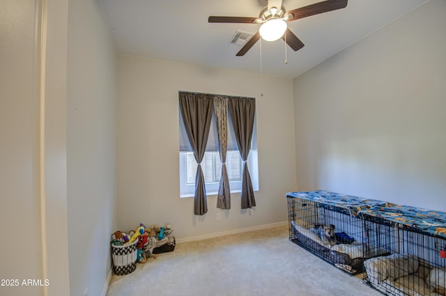 miscellaneous room with carpet floors and ceiling fan