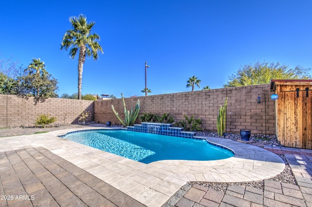 view of pool featuring a patio area