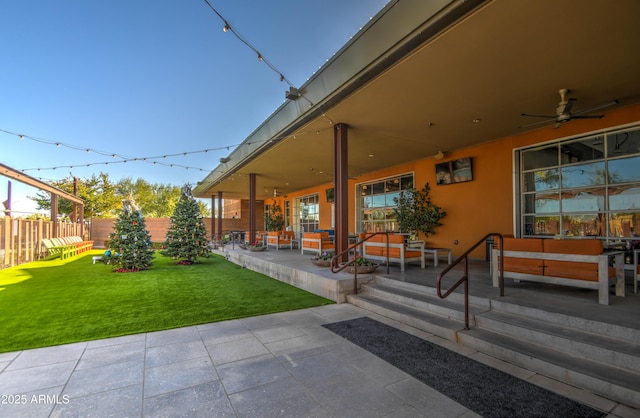 view of patio with ceiling fan