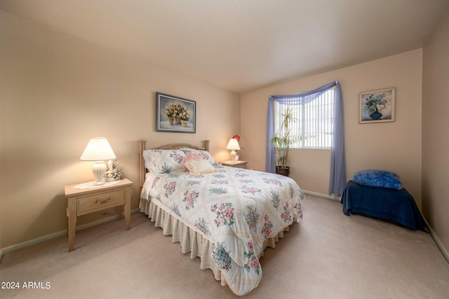 bedroom with light carpet