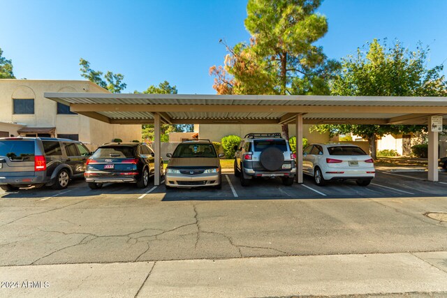 view of car parking with a carport