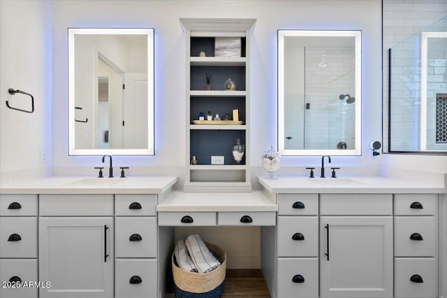 17146 W Mountainair St, Surprise, AZ 85388 - full bathroom featuring two vanities, tiled shower, and built in features
