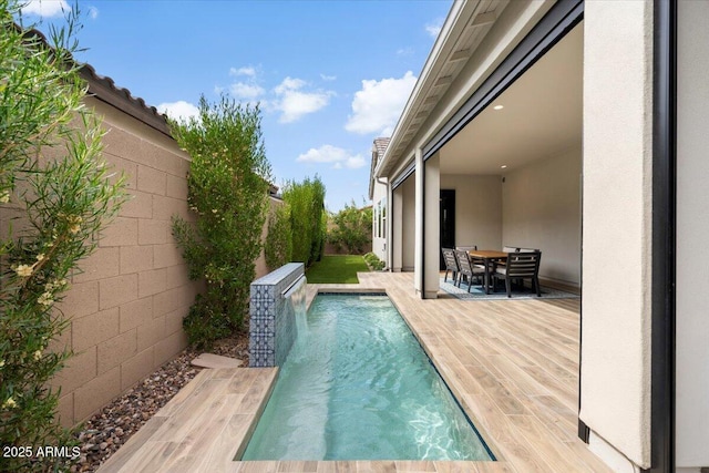17146 W Mountainair St, Surprise, AZ 85388 - swimming pool with a fenced backyard and outdoor dining space