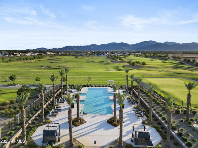 17146 W Mountainair St, Surprise, AZ 85388 - drone / aerial view of a mountainous background, a local golf course, and a pool