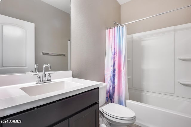 full bathroom with vanity, shower / bath combination with curtain, and toilet