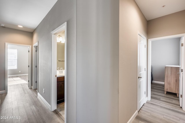 hall featuring light wood-type flooring