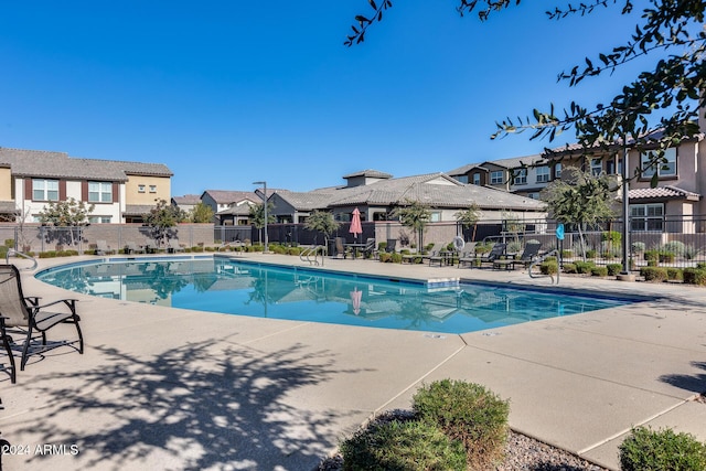 view of swimming pool featuring a patio