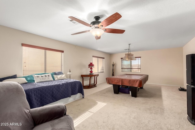 bedroom featuring light colored carpet, billiards, a ceiling fan, and baseboards