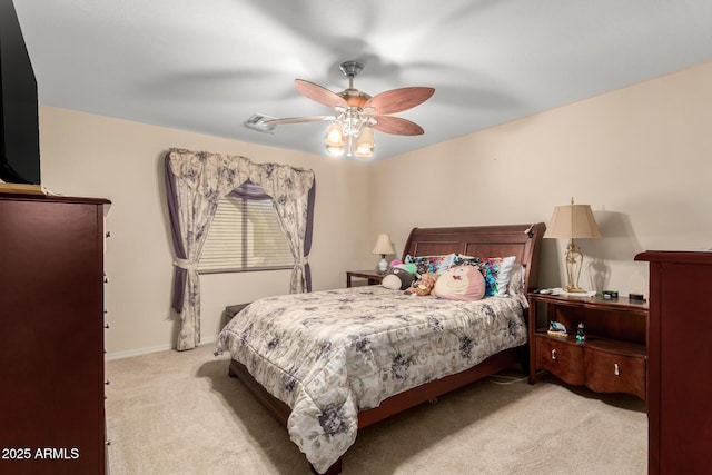 bedroom with a ceiling fan, light colored carpet, visible vents, and baseboards