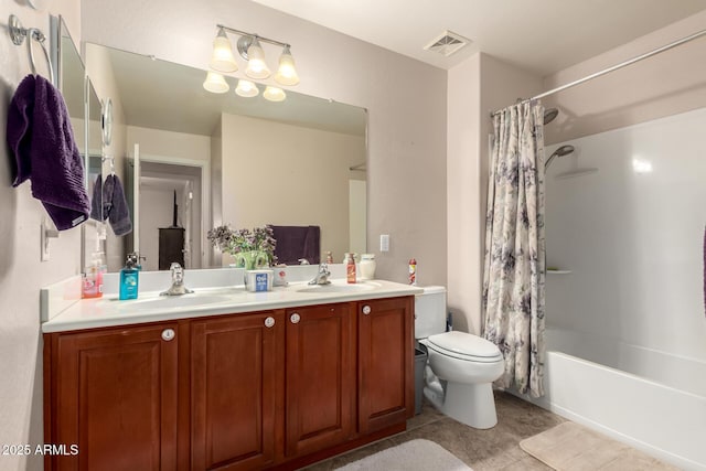 bathroom featuring toilet, shower / bath combo with shower curtain, a sink, and visible vents