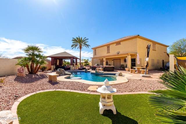 view of swimming pool with a fenced in pool, a gazebo, a patio area, a fenced backyard, and a jacuzzi