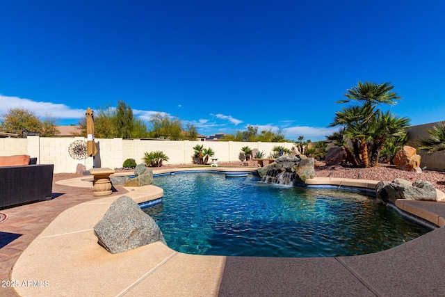 view of pool featuring a fenced in pool, a patio area, and a fenced backyard