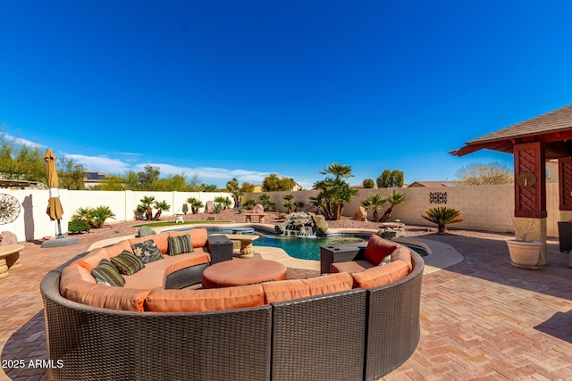 view of patio / terrace featuring a fenced backyard and a fenced in pool