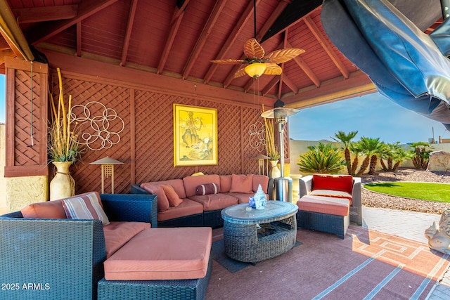 view of patio featuring ceiling fan and an outdoor living space