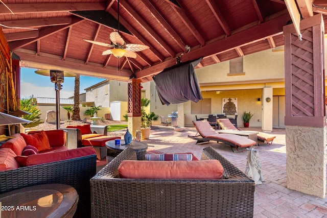 view of patio featuring ceiling fan, a gazebo, and outdoor lounge area