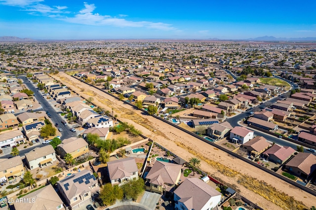 bird's eye view with a residential view and a mountain view