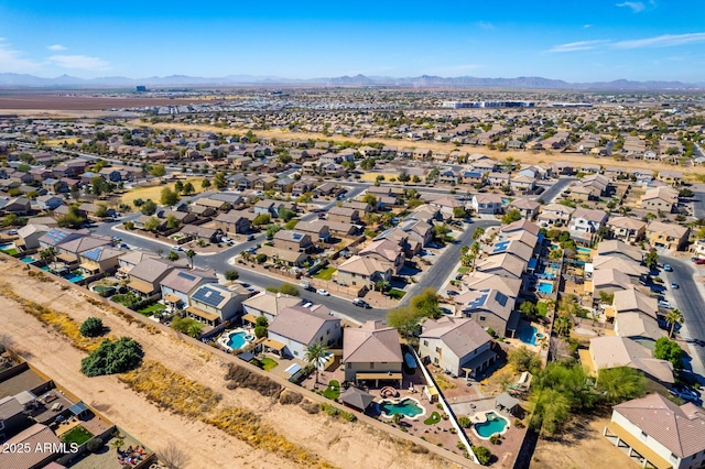 aerial view with a residential view and a mountain view