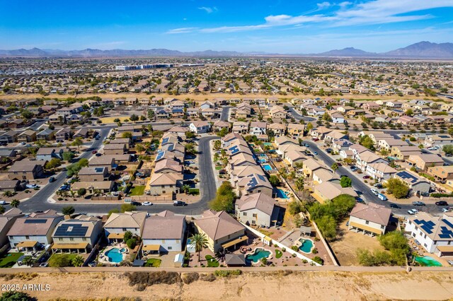 drone / aerial view with a residential view and a mountain view