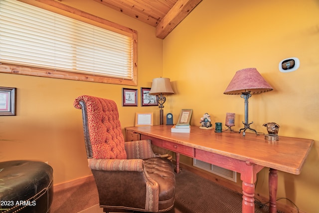 carpeted home office with wooden ceiling and beamed ceiling