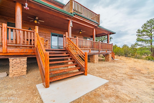 exterior space featuring a wooden deck and ceiling fan