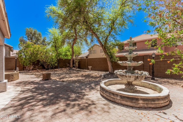 view of patio featuring a fenced backyard