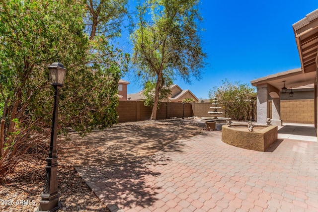 view of patio featuring a fenced backyard
