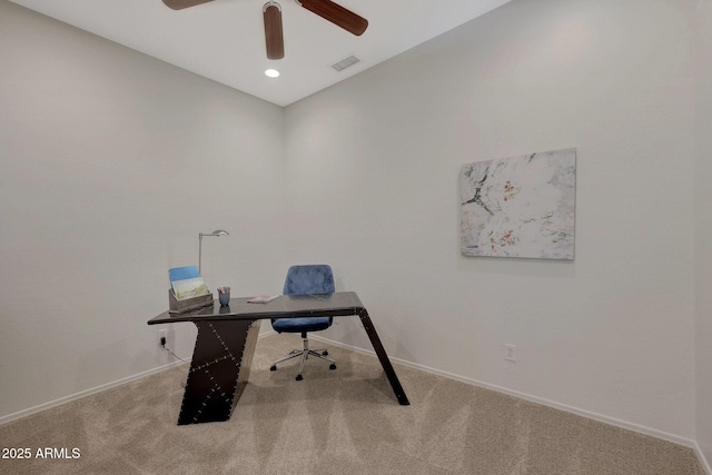 office featuring recessed lighting, light colored carpet, a ceiling fan, baseboards, and visible vents