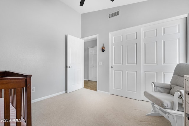 bedroom featuring carpet, visible vents, ceiling fan, and baseboards