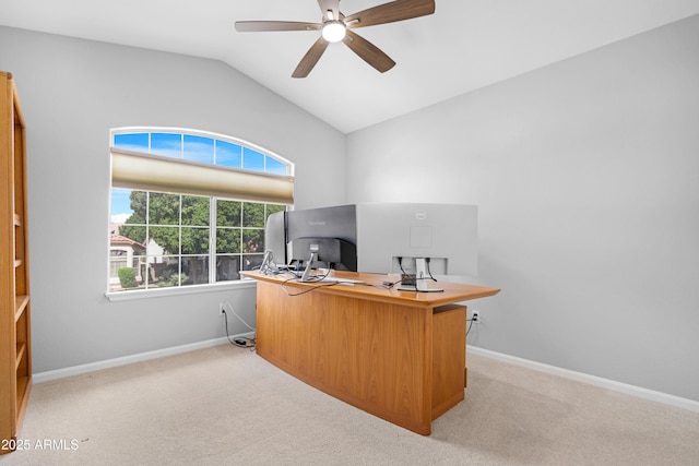 carpeted office with a ceiling fan, lofted ceiling, and baseboards