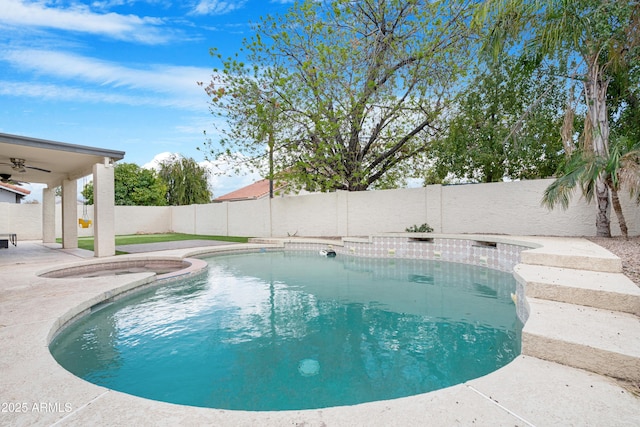 view of swimming pool featuring a fenced in pool, a fenced backyard, a patio, and a ceiling fan