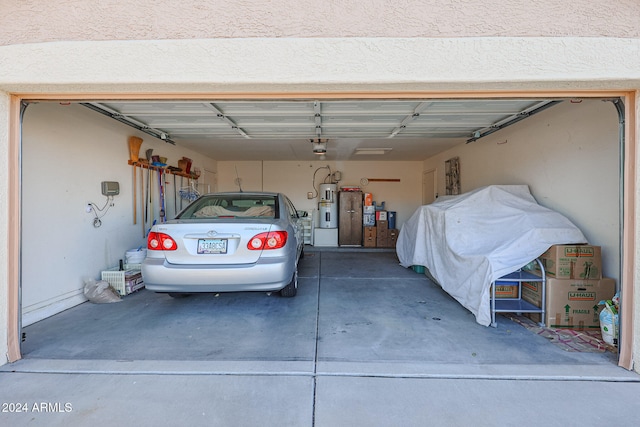 garage featuring secured water heater