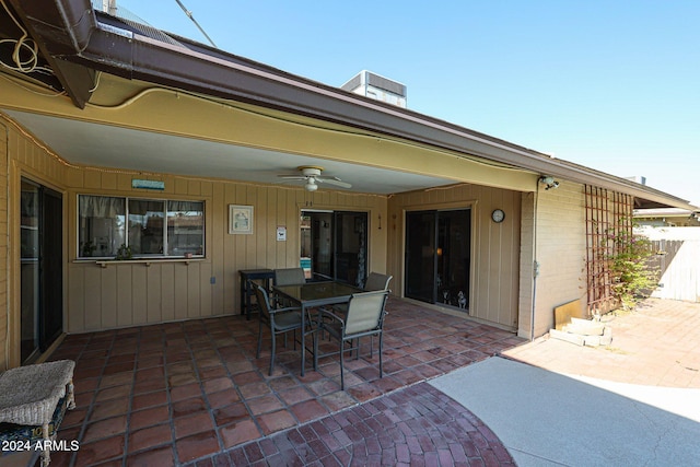 view of patio / terrace with central AC and ceiling fan