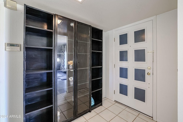 interior space with light tile patterned flooring